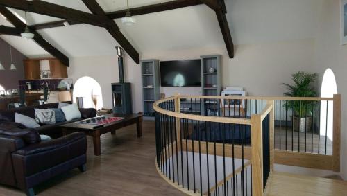 Dinas House | Chapel conversion, seaside village, in Snowdonia