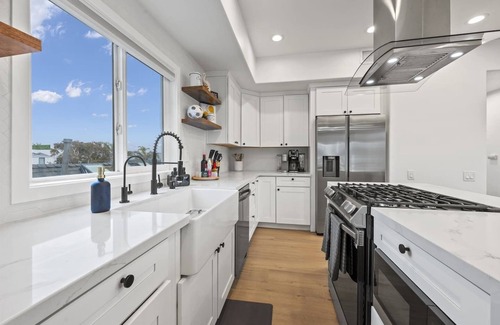 Mission Beach Condo | Charge your car here and walk to the beach!