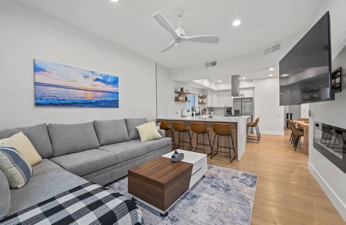 Mission Beach Condo | Charge your car here and walk to the beach!