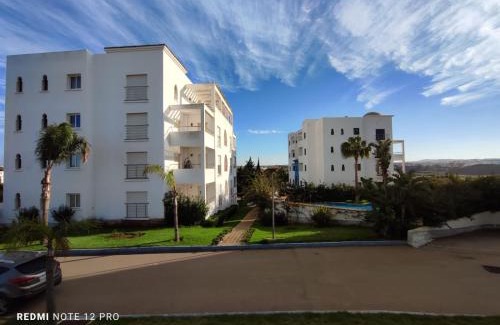 Asilah Apartment | Charmant appartement dans les jardins d Assilah Piscine et Jardin andalous