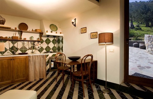 Campofelice di Roccella Ski Chalet | Charming white house with sea view and swimming pool