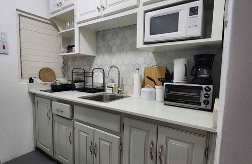 Ocho Rios Apartment | Charming 1-bedroom in Tower Isle St Mary: AC, WiFi, pool, and a serene retreat.
