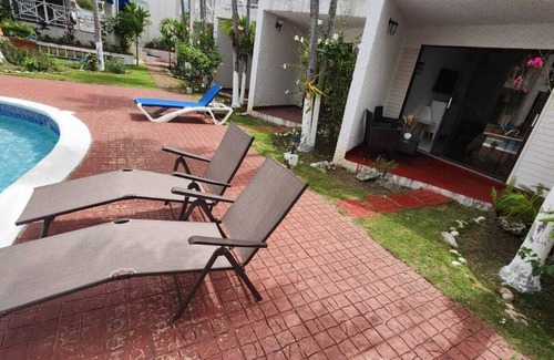 Ocho Rios Apartment | Charming 1-bedroom in Tower Isle St Mary: AC, WiFi, pool, and a serene retreat.