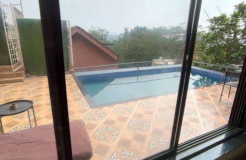 Aarey Colony Villa | Charming 1-bedroom villa with AC, WiFi in marvelous Mumbai with Swimming pool
