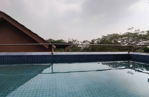 Aarey Colony Villa | Charming 1-bedroom villa with AC, WiFi in marvelous Mumbai with Swimming pool