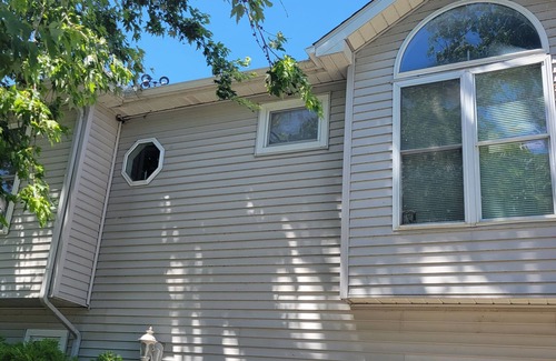 Fenton House | Charming 1450sqft Upstairs duplex on lobdell lk with amazing sunset views.