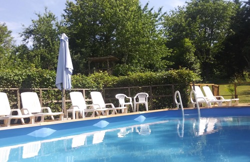 Hautefort Cottage | Charming 18c stone Perigordian farm cottage: wifi, pool, gardens, valley view
