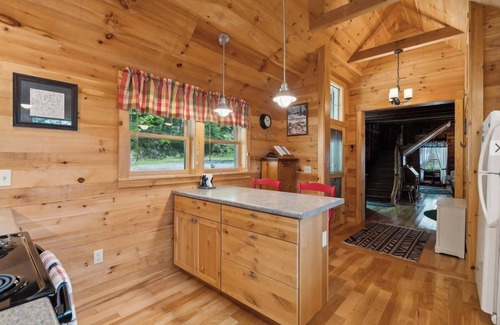 Rome Cottage | Charming 1920's lakefront cottage on Great Pond, sunsets from the dock