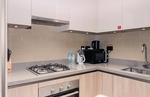 Nad Al Sheba Apartment | Charming 1BR Apt in Sobha Waves with Infinity Pool