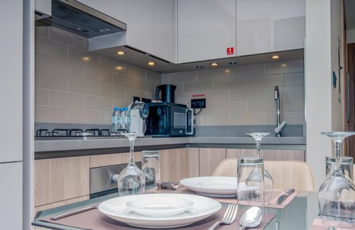 Nad Al Sheba Apartment | Charming 1BR Apt in Sobha Waves with Infinity Pool