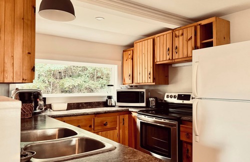 Yarmouth County Cottage | Charming 2-bedroom cottage with barrel sauna and river view