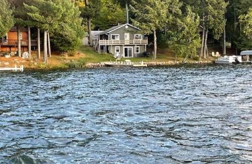 Arbor Vitae Cabin | Charming 2-bedroom cabin 30 feet from the shores of Mid Lake on Minocqua Chain
