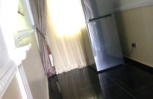 Ota House | Charming 2-bedroom house with WiFi, AC, Parking in serene Ota winners chapel