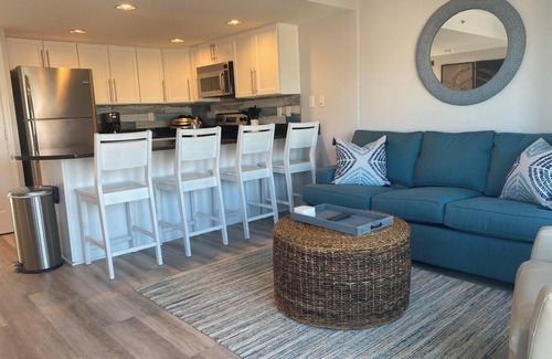 Rehoboth by the Sea Condo | Charming 2-Bedroom Condo in Dewey Beach, Pool, 1 Block to Ocean & Walk to Town!