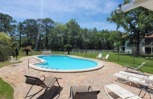 Mary Esther House | Charming 2-bedroom townhome with sound access, pool and grill