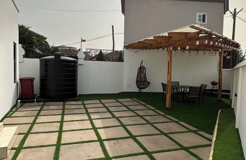Santeo House | Charming 2-bedroom home with Self-Compound, Patio, WiFi, AC & more. Welcome!