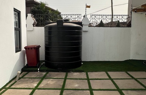 Santeo House | Charming 2-bedroom home with Self-Compound, Patio, WiFi, AC & more. Welcome!