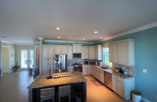 Coury House | Charming 3-bedroom house with pool and boat dock in Key Colony Beach