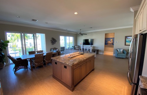Coury House | Charming 3-bedroom house with pool and boat dock in Key Colony Beach
