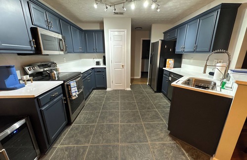 McDonough House | Charming 4-bedroom house with fire pit, rocking chair front porch and WiFI.