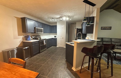 McDonough House | Charming 4-bedroom house with fire pit, rocking chair front porch and WiFI.
