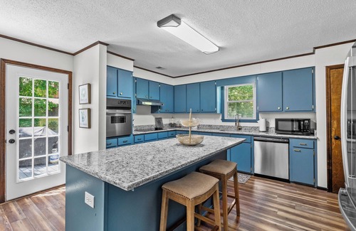 Harbison House | Charming 4-bedroom house in wooded serene neighborhood