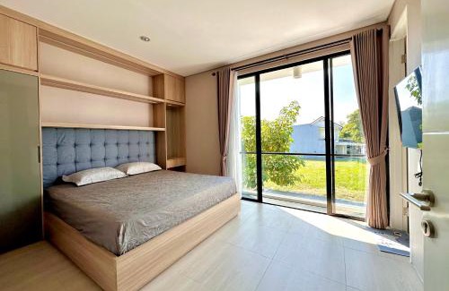 Surabaya House | Charming 4BR House in Northwest Park, West Surabaya by Le Ciel Hospitality