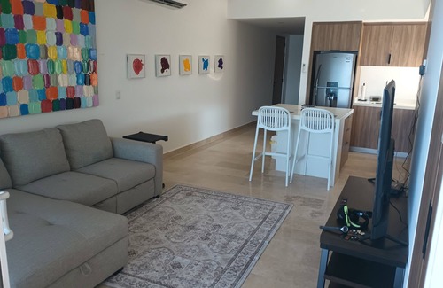 Las Glorias Apartment | Charming brand new 1-bedroom apartment with WiFi, fitness room on the beach