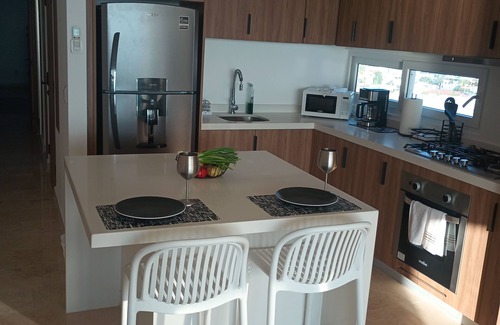 Las Glorias Apartment | Charming brand new 1-bedroom apartment with WiFi, fitness room on the beach