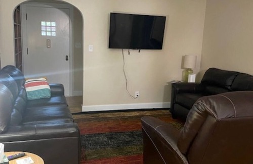 McPherson House | Charming Brick Bungalow with Basement Family Room!