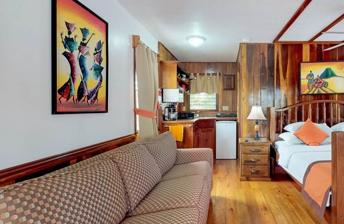 Hopkins Apartment | Charming cabana with a porch, hammock, strong WiFi, and a shared pool & grill