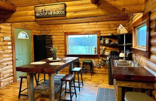Coshocton Cabin | Charming Cabin Getaway with Pond, Kayaks + Creek