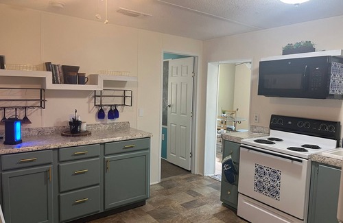 Gulfport Cottage | Charming Cottage in Gulfport overlooking 2 beautiful pondsnWIFInPet Friendly