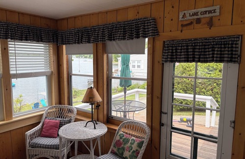 Westmore Cabin | Charming cottage on Lake Willoughby w/sun porch, private deck and dock.