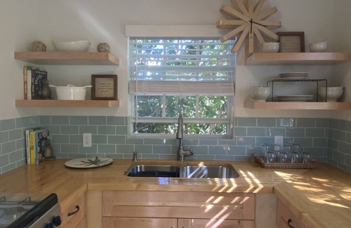 Grace Bay Cottage | Charming Cottage nestled within the trees.