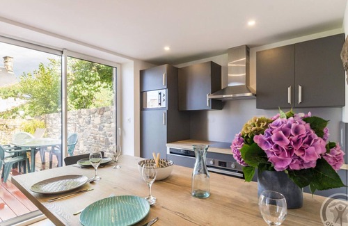 Jullouville Cottage | Charming Cottage with Terrace, Garden, and Bikes Near Beautiful Sandy Beach