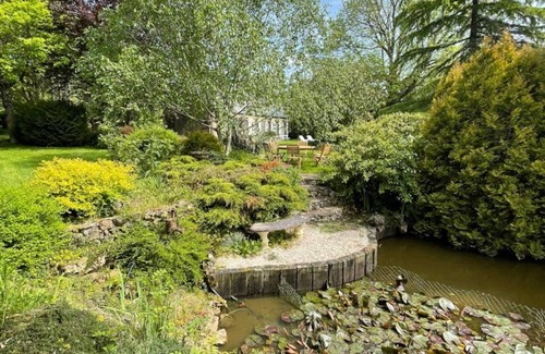 Saint-Pierre-des-Loges Cottage | Charming Manor with Private Garden, Fireplace, and Forest Access