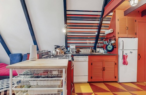 West Townshend House | Charming gingerbread A-frame situated on 3 acres, woodstove, A/C, deck