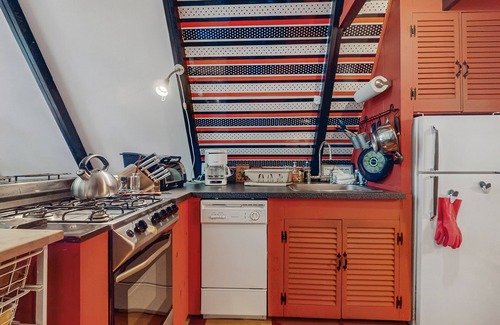 West Townshend House | Charming gingerbread A-frame situated on 3 acres, woodstove, A/C, deck