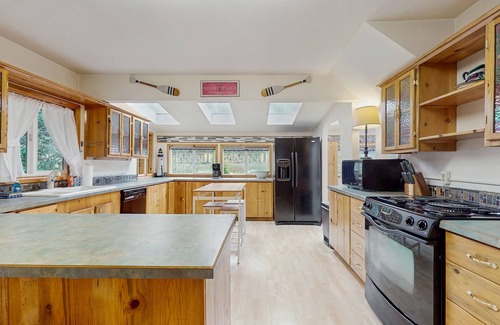 Mapleton House | Charming home on the Siuslaw River with private dock, fire pit, WiFi, & W/D