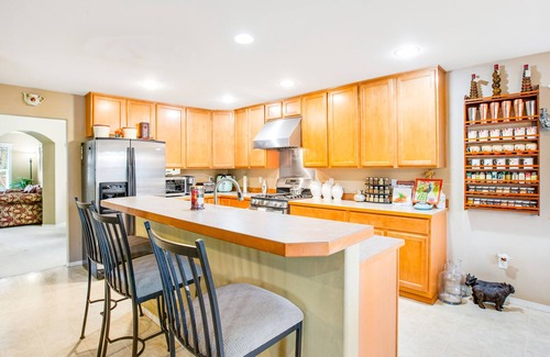 Renton House | Charming home with firepit, enclosed yard, golf nearby, & washer/dryer