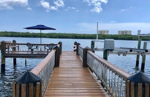 Nettles Island House | Charming House 3/2 on Waterway in Nettles Island Resort near Beach, Pools & Fun!