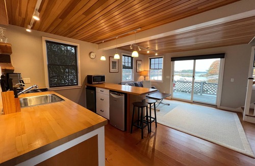 Sebascodegan Island Cottage | Charming Maine cottage overlooking the working waterfront.