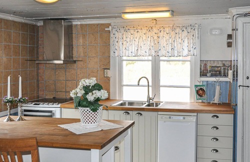 Svarta House | Charming old style house with quaint paintings from earlier times.