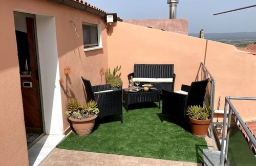 Nulvi Apartment | Charming penthouse in hamlet near the sea