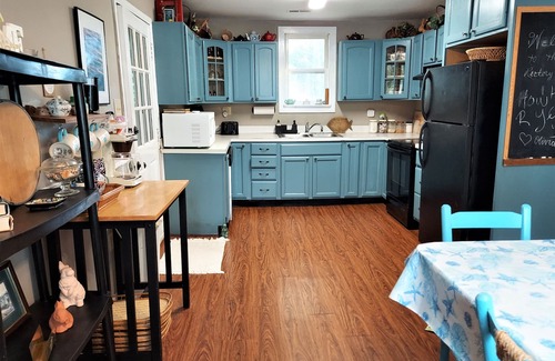 Como House | Charming restored Victorian Farmhouse and cottage on a large rural lot.