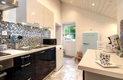 Moisdon-la-Riviere Cottage | Charming Riverside Cottage with Authentic Decor, Private Garden, and Fishing Amenities