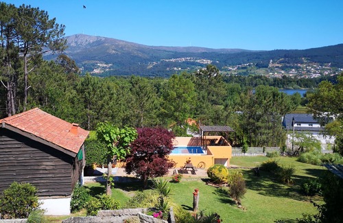 O Rosal Ski Chalet | Charming Rustic Lodge with Pool and Lovely views. Walk to Tapas Bar and Beach.