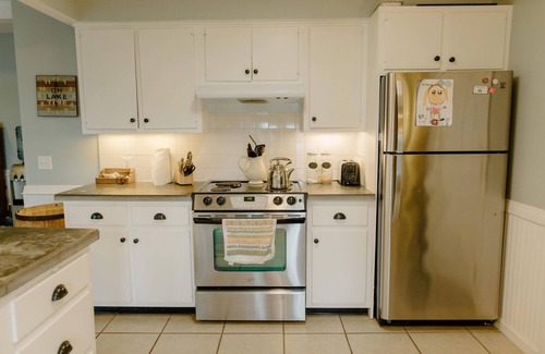 Plainwell House | Charming Serenity: A Cozy and Spacious Lake House Retreat Near Kalamazoo, MI.