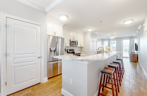 Mexico Beach Condo | Charming stay near the sea with balcony, open layout, smart TVs, & W/D